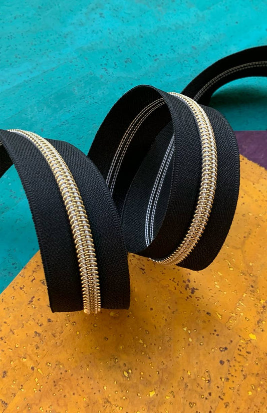 Black Zipper Tape with Gold Teeth