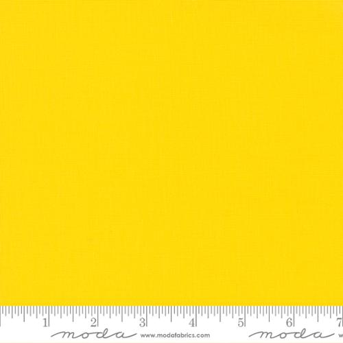 Bella Solids Sunflower Yardage by Moda Fabrics