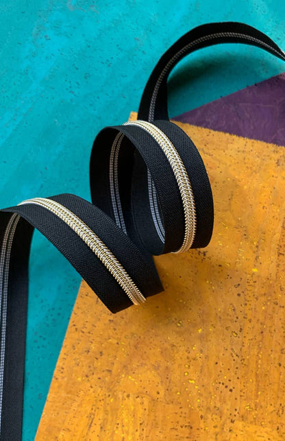 Black Zipper Tape with Gold Teeth